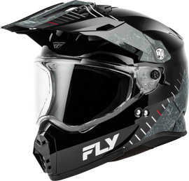 Fly Racing Fly Trekker Granite helmet in black and grey, showing the aerodynamic design and ventilation features.