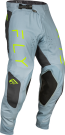 Fly Racing Evolution DST Pants in Ice Grey, Charcoal, and Neon Green size 28, showing reinforced knee areas and adjustable waist.