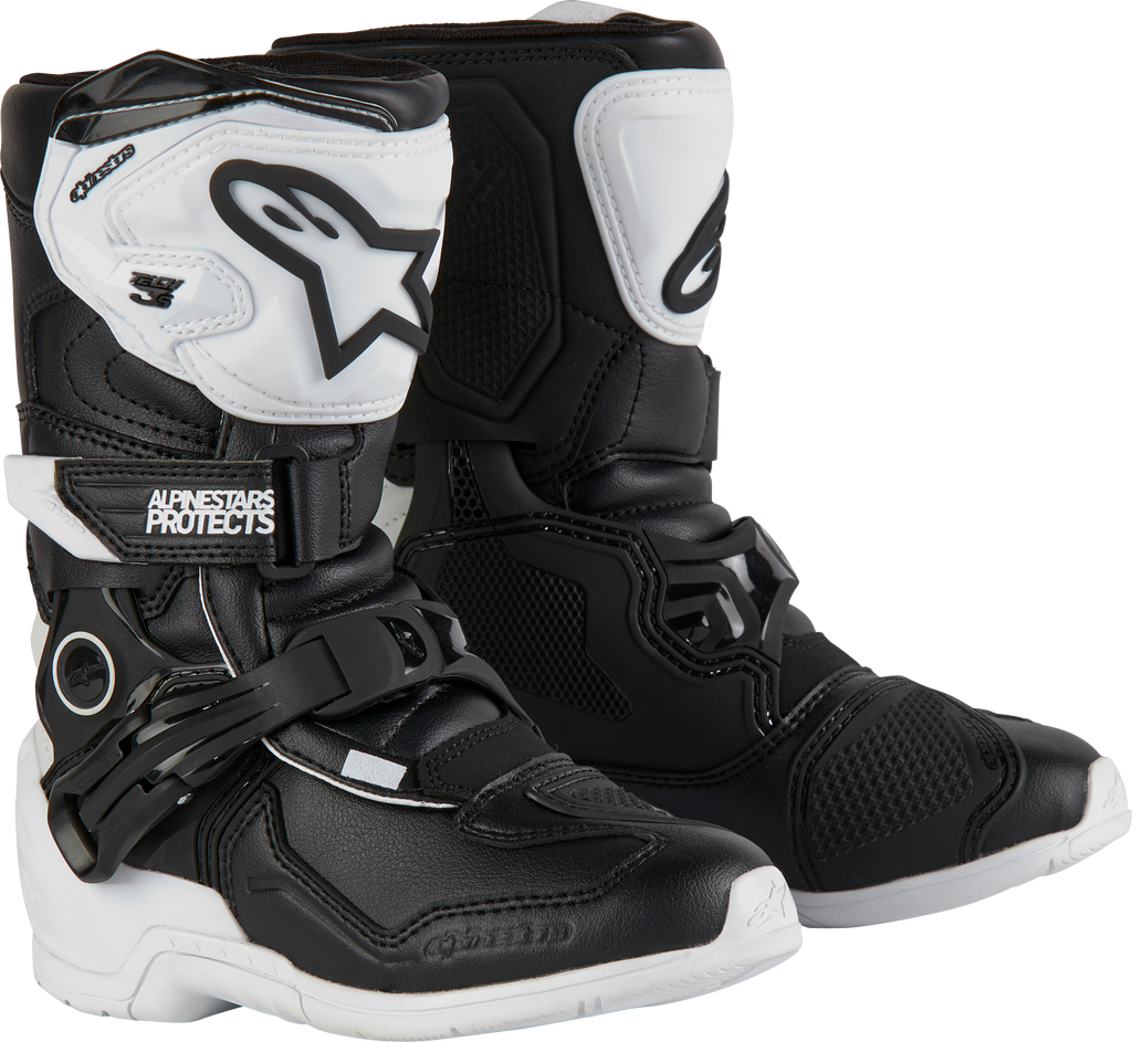 Alpine Star Tech 3s kids motocross boots in white and black, size 11, showcasing sturdy design and secure straps.