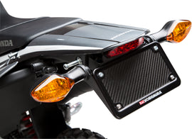 Yoshimura Fender Eliminator Kit for Honda motorcycles, showcasing sleek body design and precision mounting hardware.