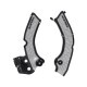 Acerbis X-Grip frame guard in black and gray mounted on motorcycle frame for protection and style.