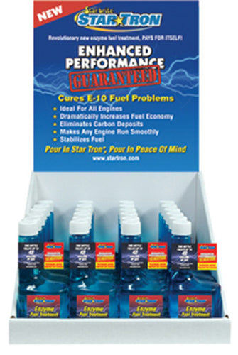 Star brite enzyme fuel treatment 8oz bottles in a 24-pack with counter display, shown in a promotional product image.