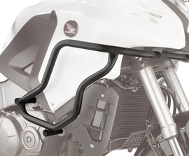 GIVI engine guards mounted on motorcycle engine, black protective bars designed to safeguard engine components.