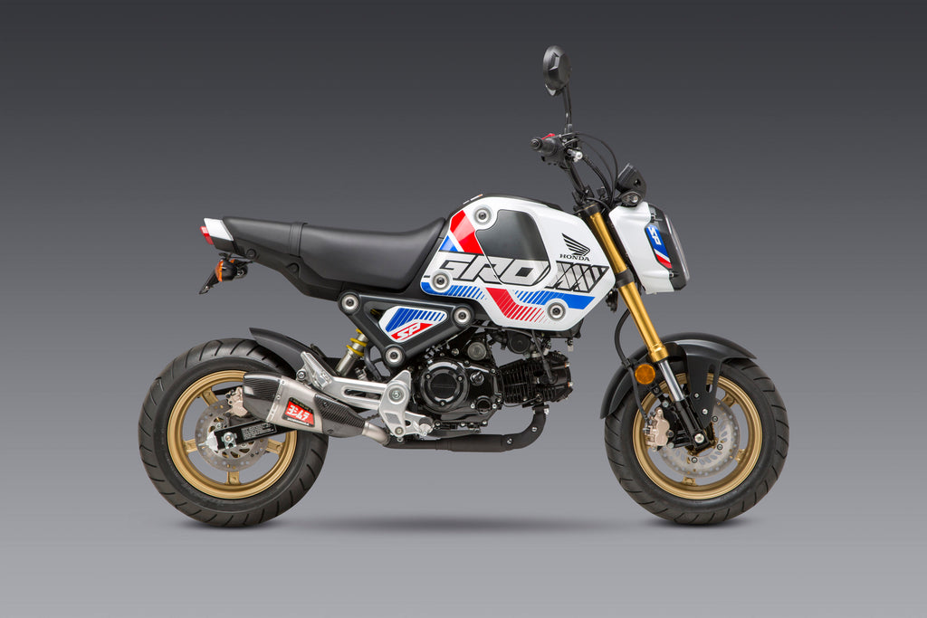 Yoshimura RS-9T street exhaust system with stainless steel and carbon fiber components, designed for motorcycle performance.