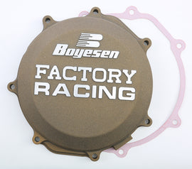 Boyesen Factory Racing magnesium clutch cover for off-road motorcycles, showcasing a sleek, durable design with branding details.
