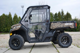 Open Trail full UTV cab with roof and doors, featuring clear windows and sturdy construction for off-road protection.