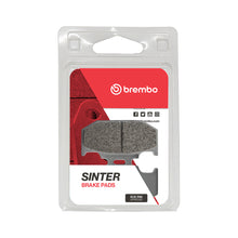 Load image into Gallery viewer, Brembo Upgrade SX Sintered Brake Pads with metal backing plates for enhanced braking performance, shown in the image.
