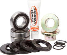 Load image into Gallery viewer, Pivot Works waterproof rear wheel collar kit for Kawasaki drive models, showing the metal collar and mounting hardware.