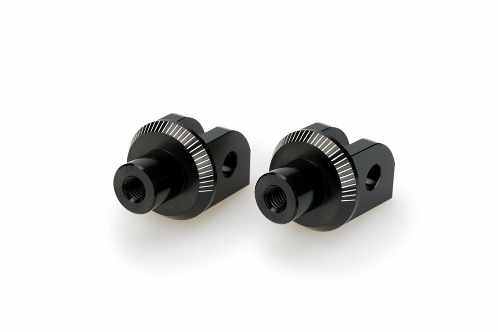 PUIG footpeg adaptor for Suzuki motorcycles, black foot controls upgrade with sturdy mounting hardware and textured surface.