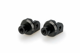 PUIG footpeg adaptor for Suzuki motorcycles, black foot controls upgrade with sturdy mounting hardware and textured surface.