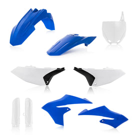 Acerbis full plastic kit for motorcycle, showing various black plastic panels and parts laid out on a surface.