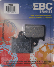 EBC Motorcycle Brakes Fa109 organic brake pads with metal backing, shown in a close-up of the brake pad design and material.