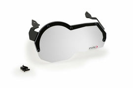 Clear PUIG headlight protector for BMW, showing a transparent, durable cover fitted on a motorcycle headlight.