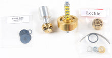 Load image into Gallery viewer, Race Tech Gold Valve fork suspension for motorcycle, showing the metallic gold valve component and part of the suspension assembly.