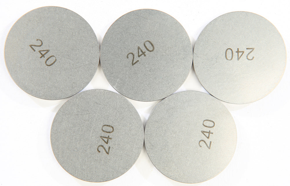 K&L engine valve shims, 2.40mm x 29mm, set of 5, for precise engine valve adjustments, shown on a clean surface.