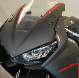 New Rage Cycles front LED turn signals with illumination for motorcycle, featuring clear lenses and compact design.