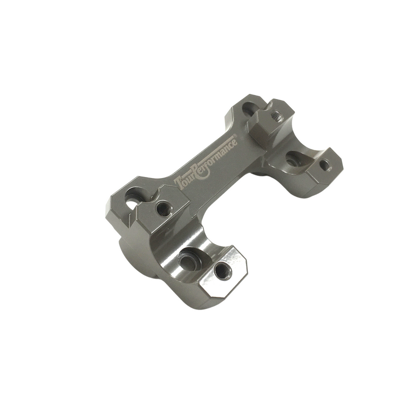 Silver HeliBars handlebar risers for Yamaha motorcycle, showing the risers attached to the handlebars in a close-up view.