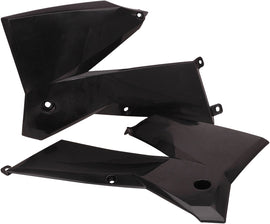 Black Acerbis radiator shrouds for off-road motorcycles, featuring sleek design and durable plastic construction.