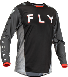 Fly Racing Kinetic Kore jersey in black and grey, medium size, lightweight motocross riding jersey with breathable fabric.
