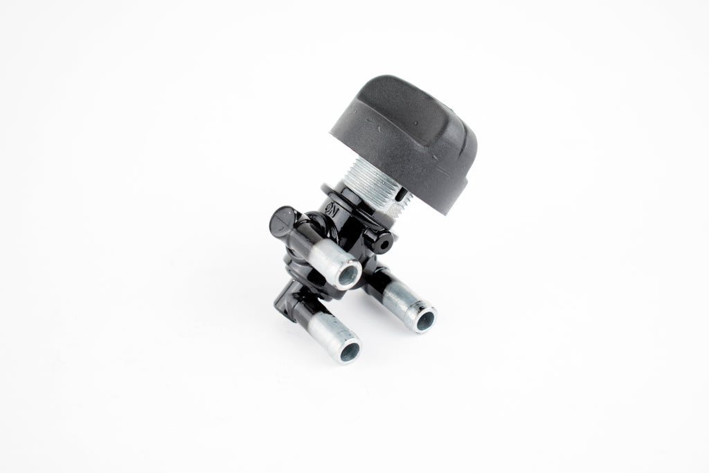 WSM Performance Parts fuel valve with 3-position S-D switch for intake and carburetor fuel system, black metal construction.