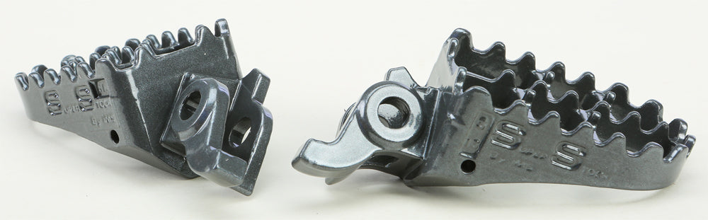 IMS Super Stock Foot Pegs for motorcycle foot controls, featuring durable metal construction with textured surfaces for grip.