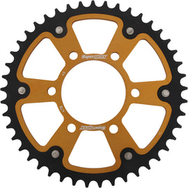 Supersprox rear stealth aluminum and steel 45-tooth street motorcycle sprocket for Kawasaki 520 Gld bike, shown in gold color.