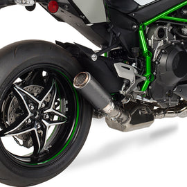 Hotbodies Racing Mgp Stinger Slip-On exhaust in matte carbon finish for Kawasaki motorcycle, showing the sleek, lightweight design.