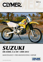 Clymer Suzuki DRZ400E/S/SM repair manual open to pages showing engine diagrams and technical repair instructions.