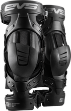 Load image into Gallery viewer, EVS Axis Sport knee brace pair in black and grey, medium size, designed for support and protection during sports activities.