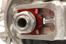 Load image into Gallery viewer, WORKS Axle Blocks Elite Hon Red drive axle blocks, featuring vibrant red color and durable construction for vehicle stability.
