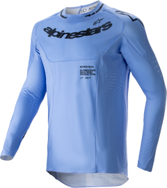 Light blue Alpine Star Supertech Dade motocross jersey in large size, featuring branding and lightweight fabric.