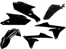 Acerbis black plastic kit for off-road motorcycle, includes various plastic panels for body protection and customization.