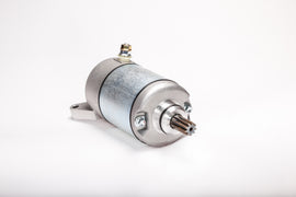 Ricks Motorsport Electric starter motor, model 27-61411, showing the compact metallic component with wiring connections.