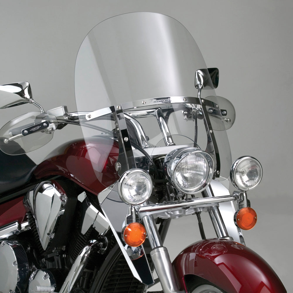 National Cycle Switchblade 2-Up Clear Windshield mounted on motorcycle, showing transparent design and sturdy frame.