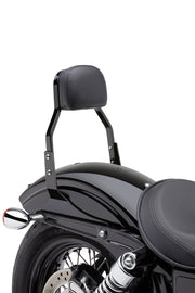 Black Cobra Mini Sissy Bar for Dyna motorcycles from 2006 to 2017, shown attached to the bike's body.
