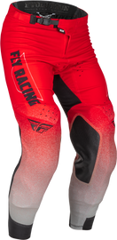 Fly Racing Evolution DST pants in red and grey, size 36, with reinforced fabric and sleek motocross riding design.