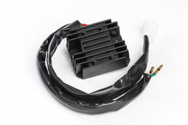 Ricks Motorsport Electric regulator and rectifier for motorcycle electrical systems, with metal and plastic components.