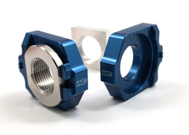 Blue WORKS Axle Blocks Elite KTM/Hus drive tool for secure motorcycle wheel mounting, shown in close-up view.