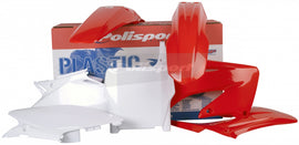 Red Polisport Plastics plastic body kit for motocross or dirt bikes, showing the full assembly with mounting points.