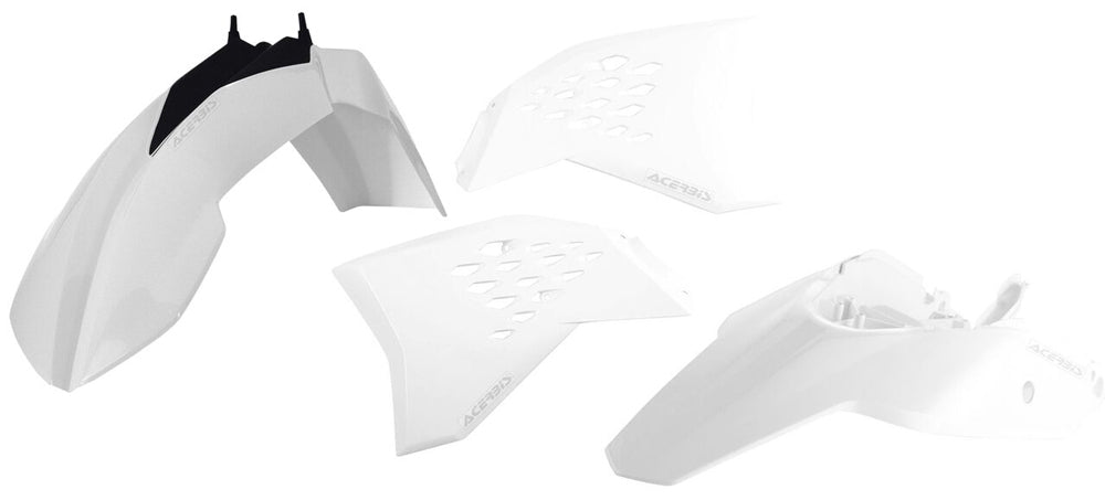 Acerbis white plastic kit for motorcycle, featuring various protective and body panels, arranged on a flat surface.