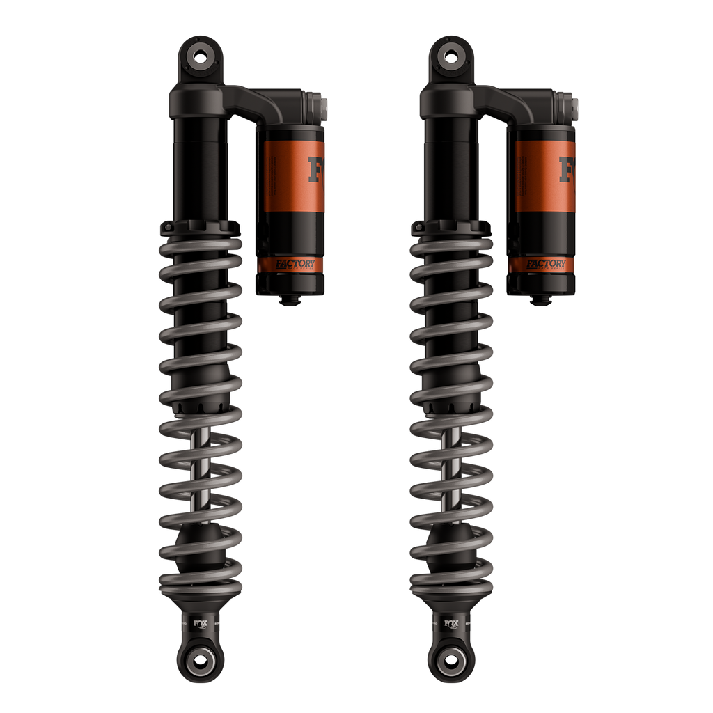 Fox 1.5 Podium RC2 Utility Shocks for ATV suspension, showing durable shock absorbers with mounting hardware.