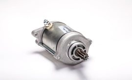 Ricks Motorsport Electric starter for motorcycles, compact black electric starter with mounting components and wiring.