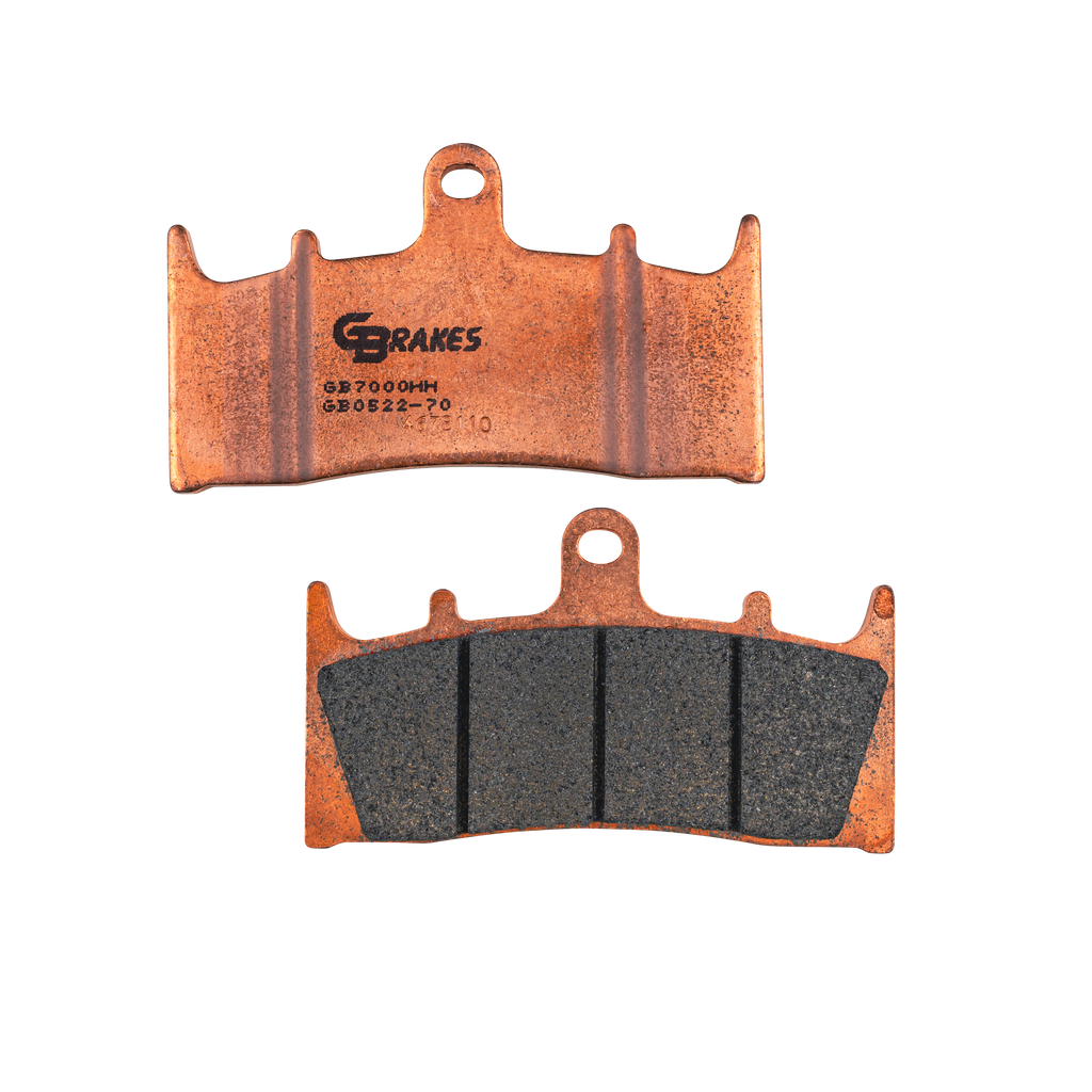 GBRAKES sintered brake pads for enhanced stopping power, shown in a close-up image with metallic friction surfaces.
