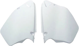 Acerbis white side panels for motorcycle, featuring sleek design and durable plastic construction.
