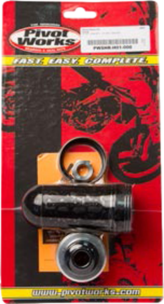Pivot Works Shock Repair Kit 52-12056 for suspension systems, showing various seals, o-rings, and components on a clean work surface.