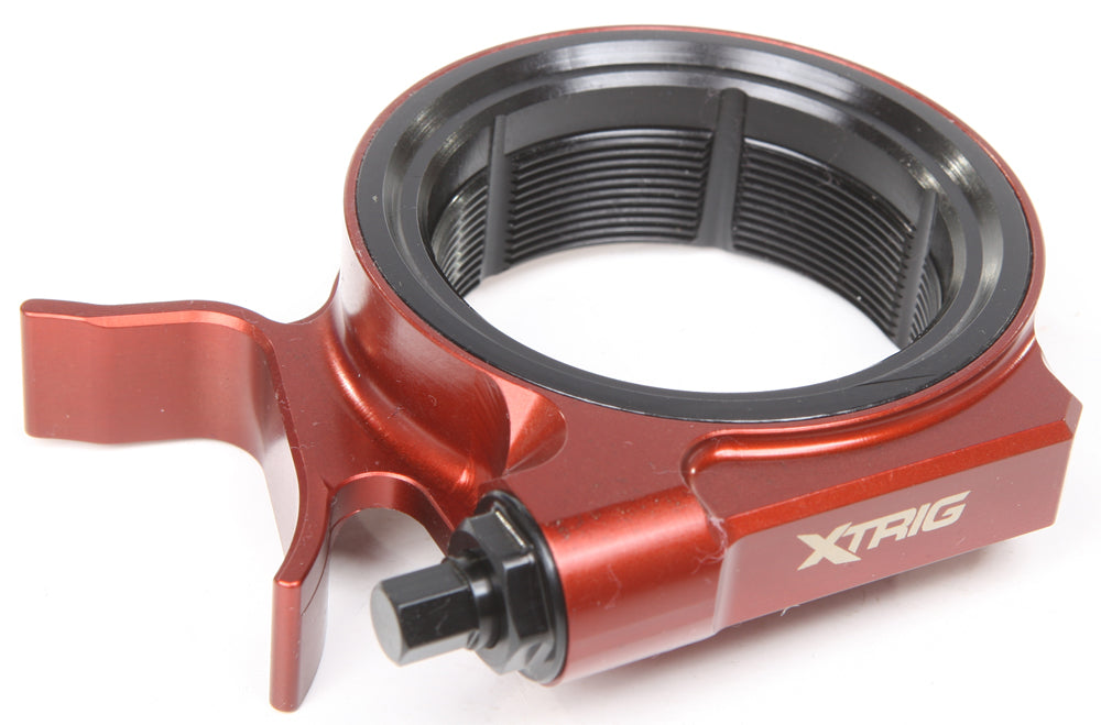 XTRIG Pre-Load Adjuster for Yamaha suspension, showing the black metal component with adjustment knob and mounting details.