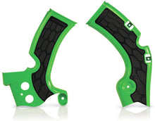 Charger l'image dans la galerie, Acerbis X-Grip frame guard in green and black on motorcycle frame, showing textured surface and branding detail.