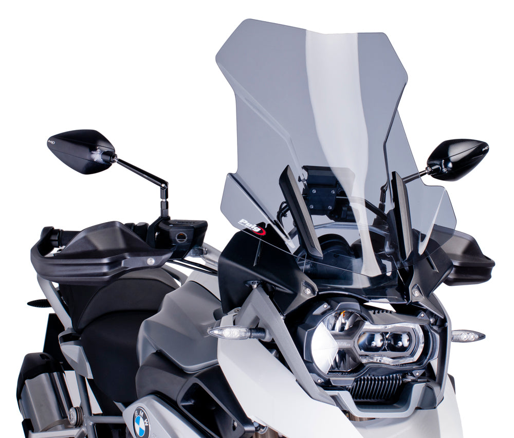 PUIG touring smoke windshield for BMW motorcycle, clear view with tinted finish, designed for optimal wind protection and style.