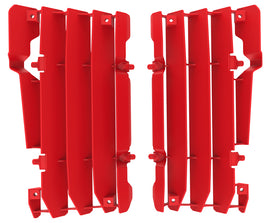 Red Polisport Plastics radiator louver for motorcycles, model 64-56544, with vented design for cooling airflow.