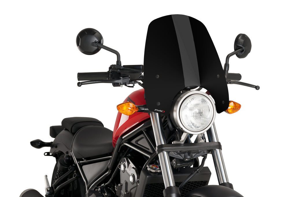 PUIG Naked New Gen Touring black windshield for motorcycle, with a sleek aerodynamic design and mounting hardware visible.